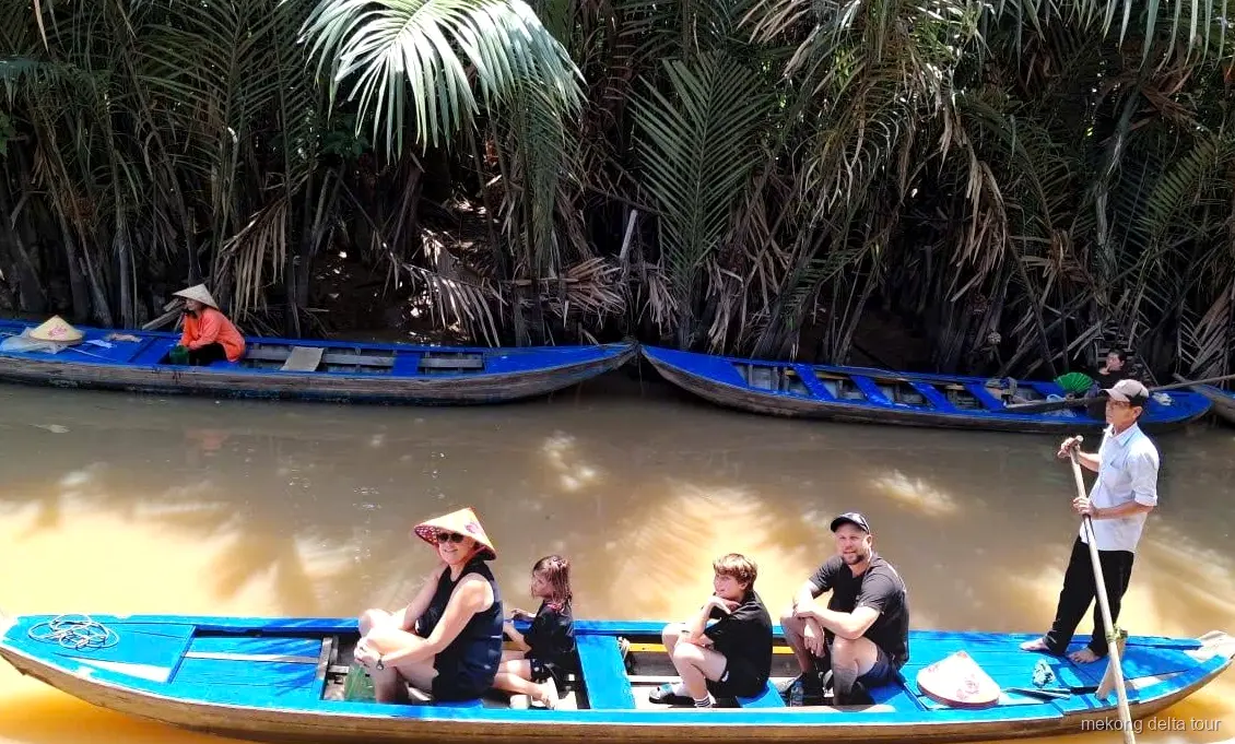 Motorboat cruise past the four islets on the Tien River
