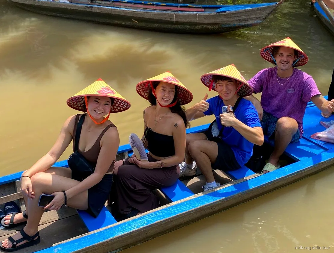 Riverside lunch in an orchard garden on the Mekong Delta day tour