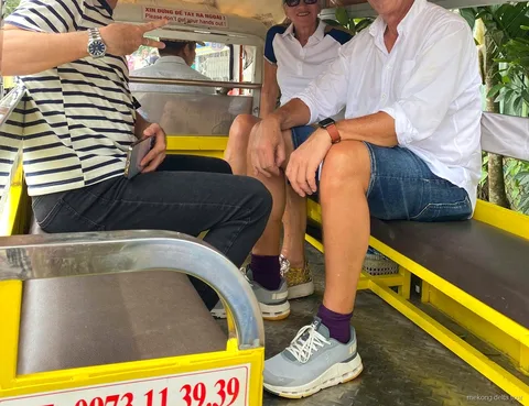 Coconut candy workshop visited on the Mekong Delta fish farm tour