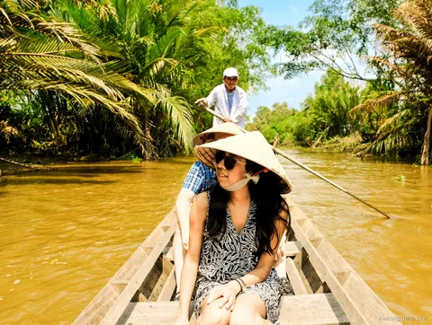 Family homestead visit with fresh coconut tasting on the speedboat tour