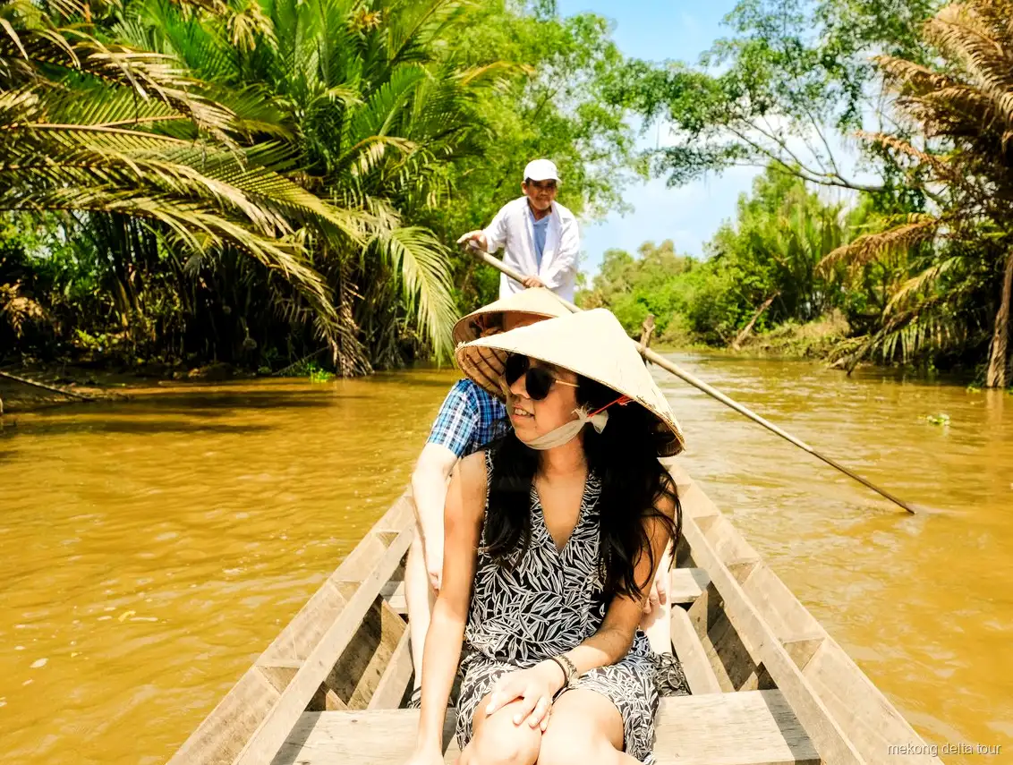 Family homestead visit with fresh coconut tasting on the speedboat tour